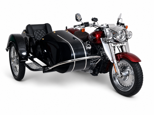 A black and red side-by-side motorcycle with a black sidecar, photographed on a clean white studio background.