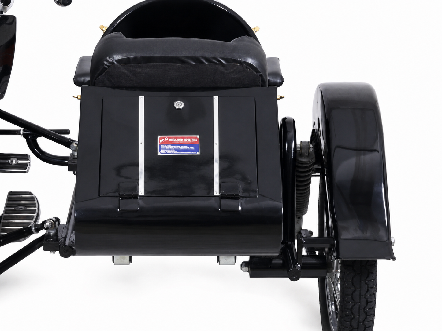 Rear panel close-up of a black Retro motorcycle passenger sidecar with spoke wheel and suspension on a white background