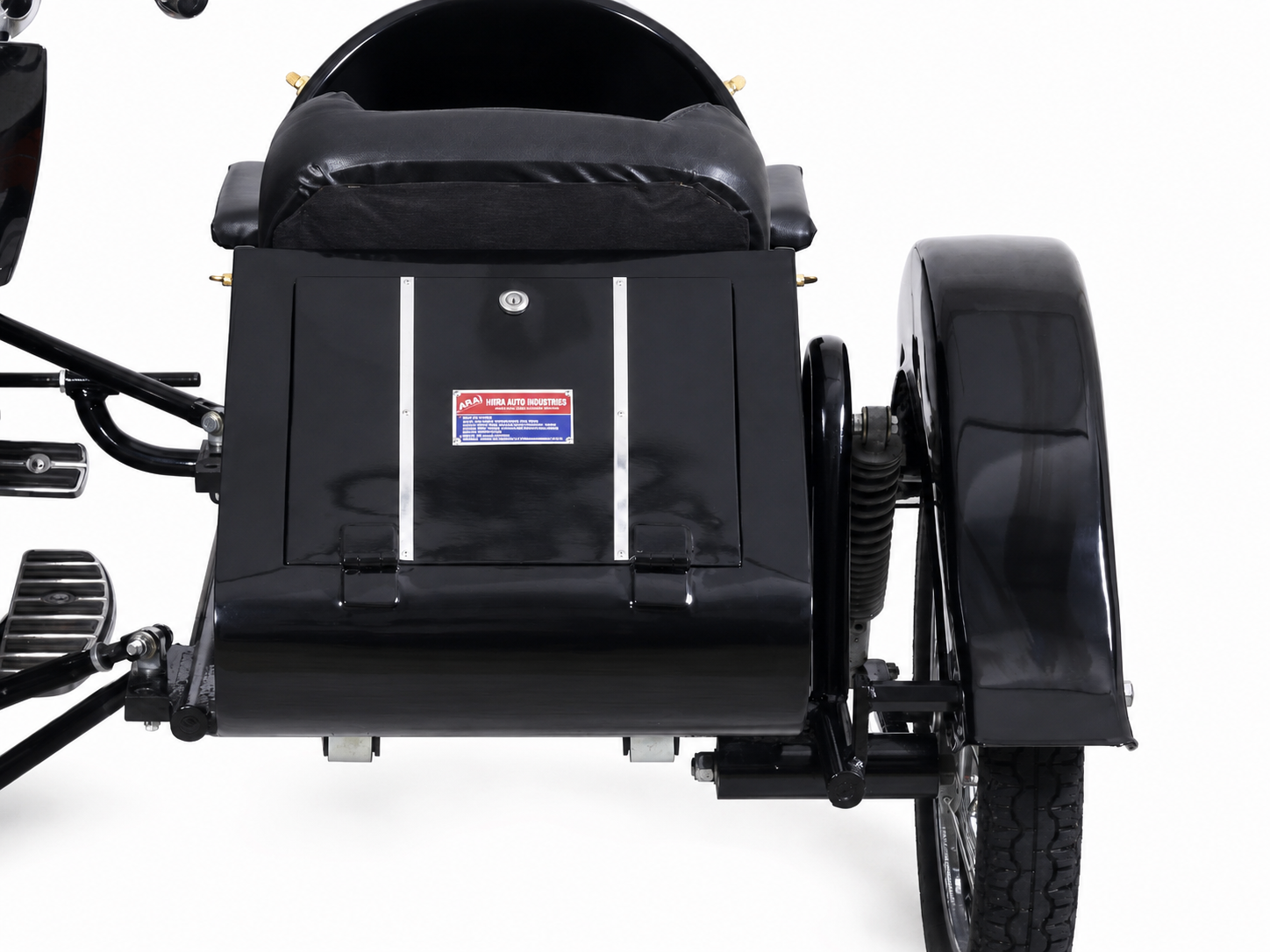 Rear panel close-up of a black Retro motorcycle passenger sidecar with spoke wheel and suspension on a white background