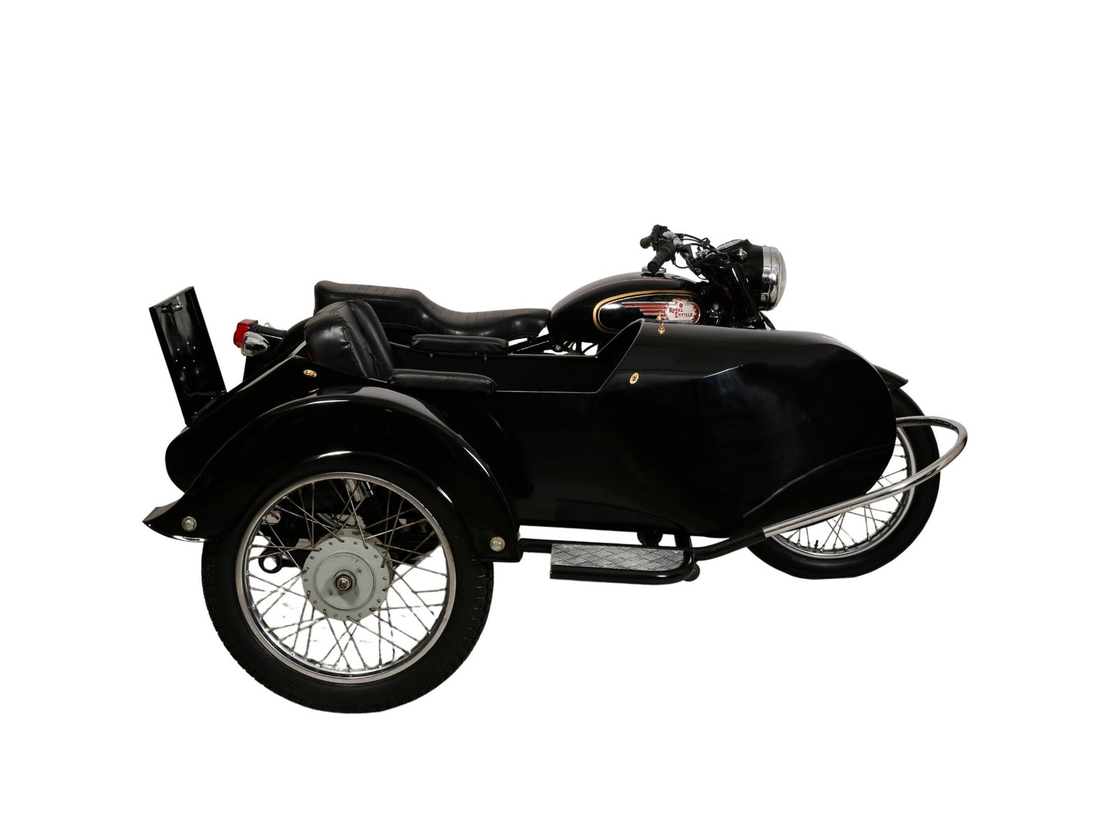 Side view of a black Retro passenger sidecar with its rear storage panel open, attached to a Royal Enfield motorcycle on a white background.
