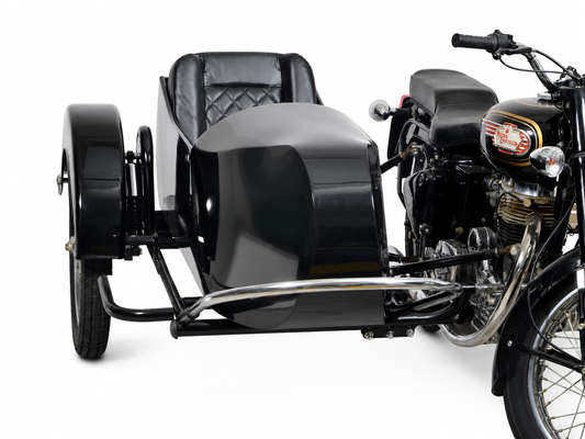 Front three-quarter view of a black Vintage passenger sidecar attached to a Royal Enfield motorcycle on a white background.