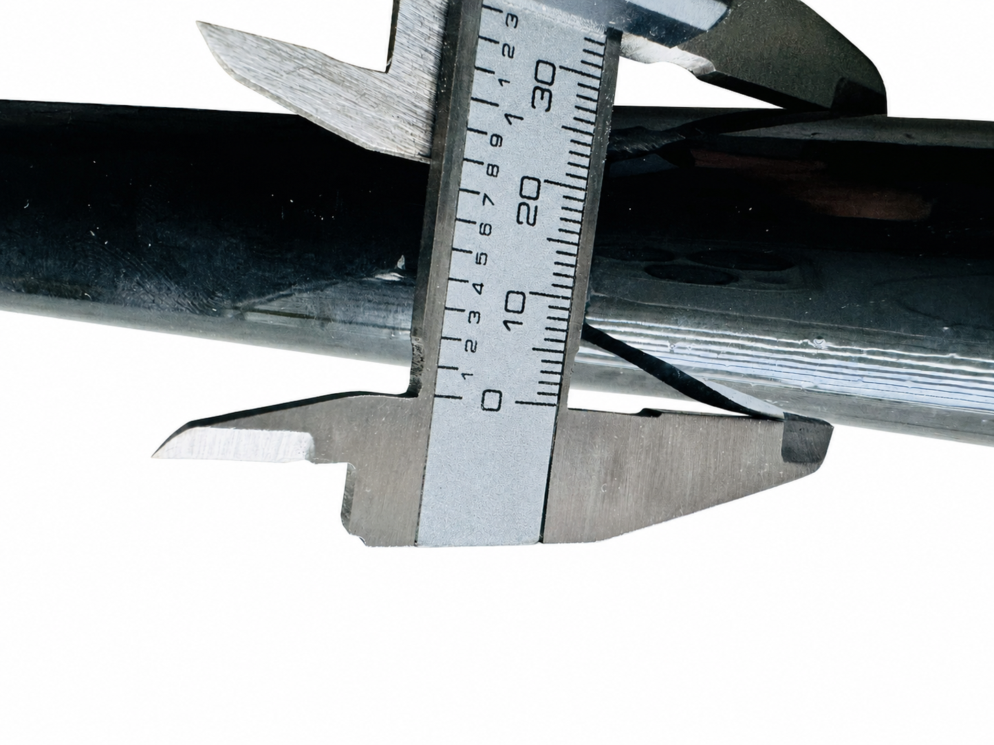 Close-up of a motorcycle sidecar J Bar with its original vernier caliper thickness measurement.