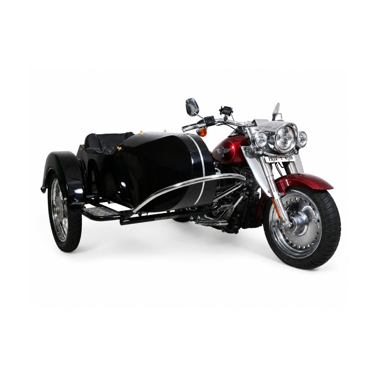 Front three-quarter view of a glossy black Retro passenger sidecar attached to a red cruiser motorcycle on a white background.