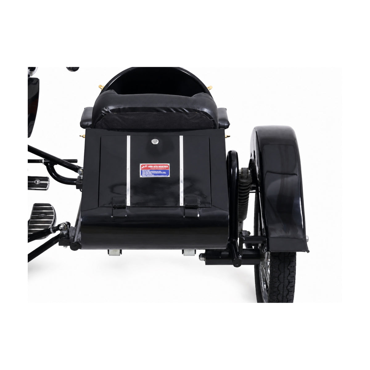 Rear panel close-up of a black Retro motorcycle passenger sidecar with spoke wheel and suspension on a white background